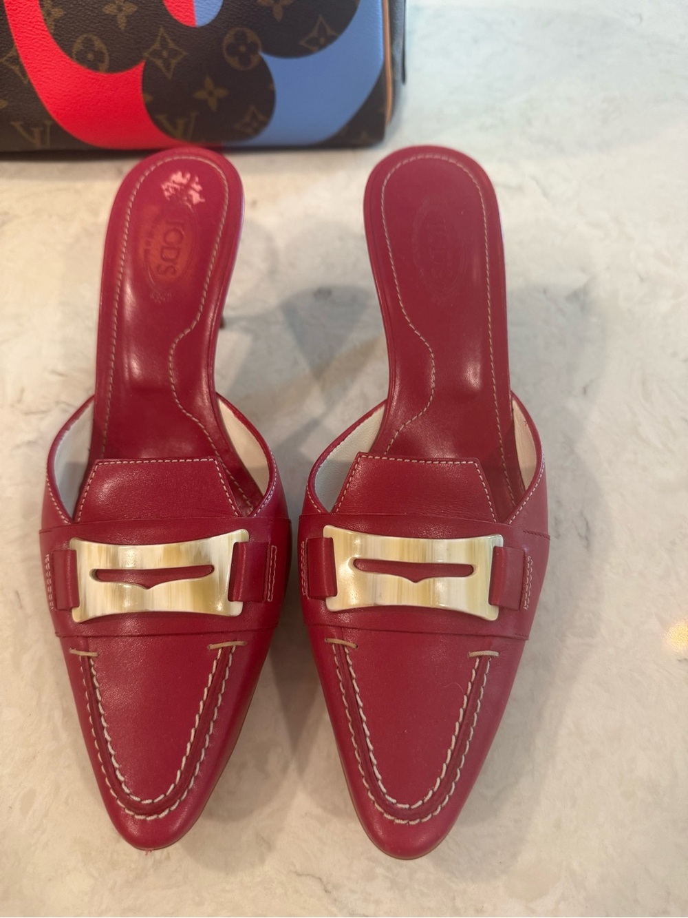 Tod's Red Leather Pointed-Toe Mule with Gold Buckle